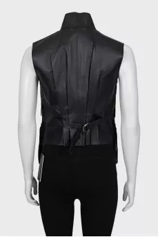 Leather vest with fringe and tag