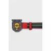Textile belt with massive buckle