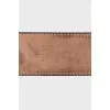 Belt with embossed print on leather