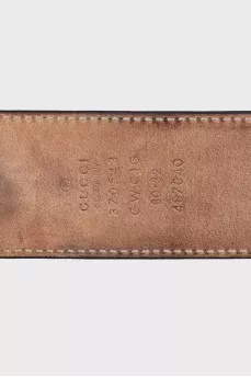 Belt with embossed print on leather