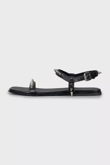 Leather sandals with spikes