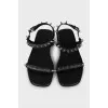 Leather sandals with spikes