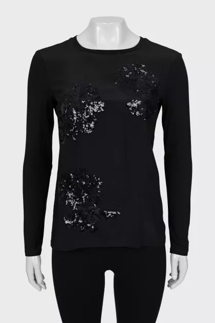 Blouse decorated with sequins