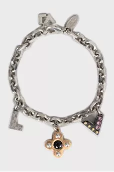 Set of earrings and bracelet with pendants