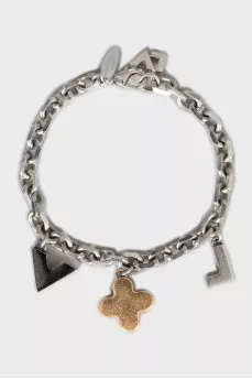 Set of earrings and bracelet with pendants