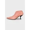 Pink high heel ankle boots