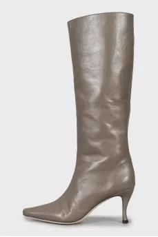 Brown boots with a figured heel