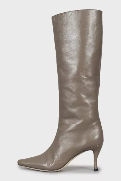 Brown boots with a figured heel