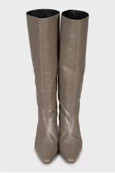 Brown boots with a figured heel