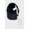 Denim cap with tag