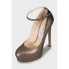 Golden high heels
