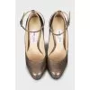 Golden high heels