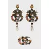 Gold set of earrings and ring