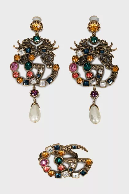 Gold set of earrings and ring