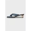 Blue leather mules with a figured heel