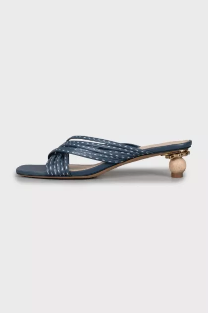 Blue leather mules with a figured heel