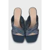 Blue leather mules with a figured heel