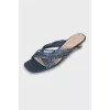 Blue leather mules with a figured heel
