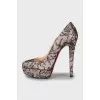 High heel shoes decorated with lace