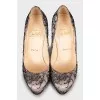 High heel shoes decorated with lace