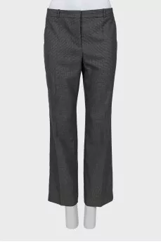 Trousers with arrows in a small print
