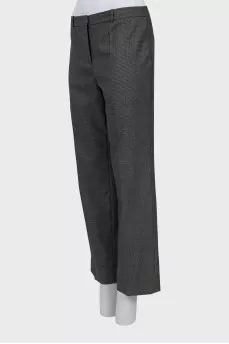 Trousers with arrows in a small print