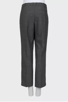 Trousers with arrows in a small print