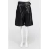 Wide black bermuda shorts