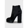Black pony skin ankle boots