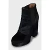 Black pony skin ankle boots
