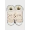 Ugg boots with laces decorated with fur