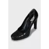 Black shoes with embossed leather