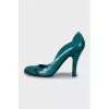 Green shoes with embossed leather
