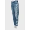 Jeans with ripped effect on the sides
