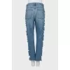 Jeans with ripped effect on the sides