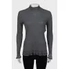 Gray turtleneck with torn effect