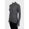 Gray turtleneck with torn effect