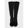 Leather boots with raised seams