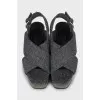 Textile sandals with a figured wedge heel