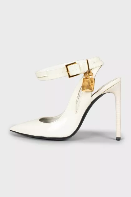 Patent leather shoes with a golden lock