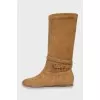 Suede boots with tag