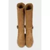 Suede boots with tag