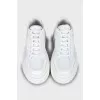 Leather sneakers with brand logo