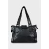 Black bag with perforated leather