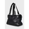 Black bag with perforated leather