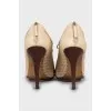 Ankle boots with perforated leather