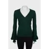 Knitted pullover with ruffles on the sleeves