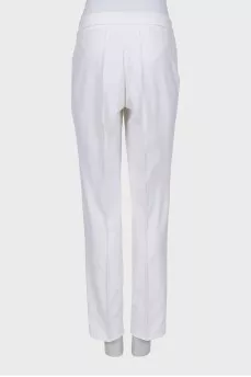 White trousers with stitched creases