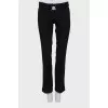 Flared trousers with a mid-rise