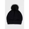 Black hat with pompom